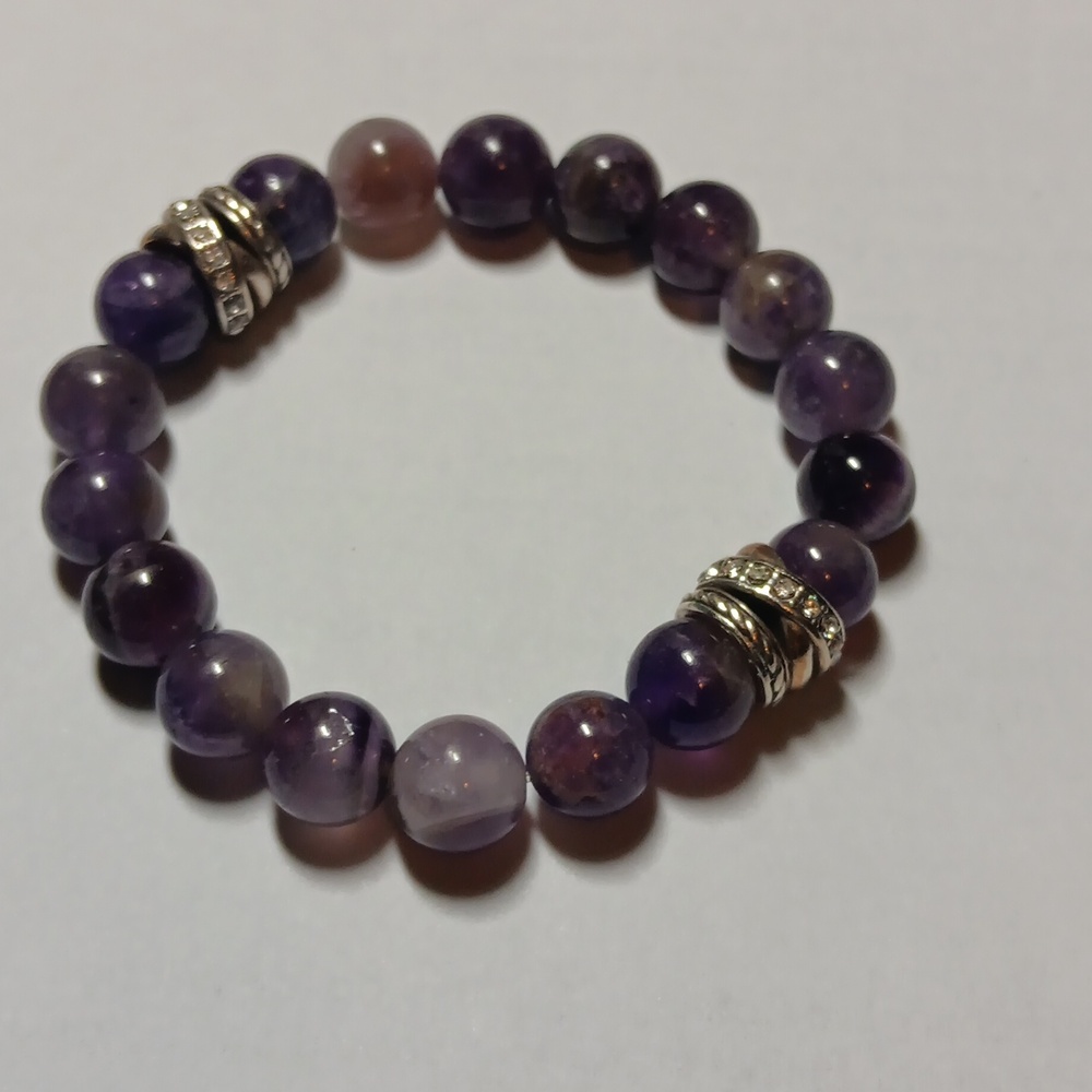Bracelet  , purple stretch  with gold and silver beads  with rhinestones